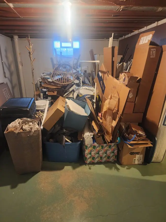 Roll-off dumpster container at job site for 8 Yard Dumpster Rental in Northport